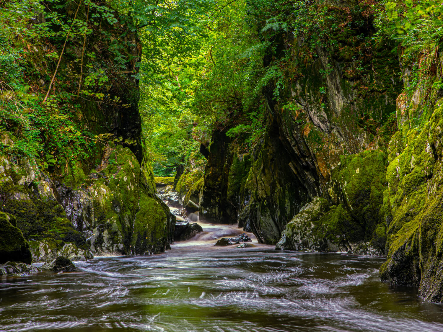 Idyllic waterfall and river in Snowdonia National Park