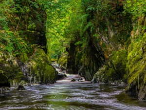 Idyllic waterfall and river in Snowdonia National Park