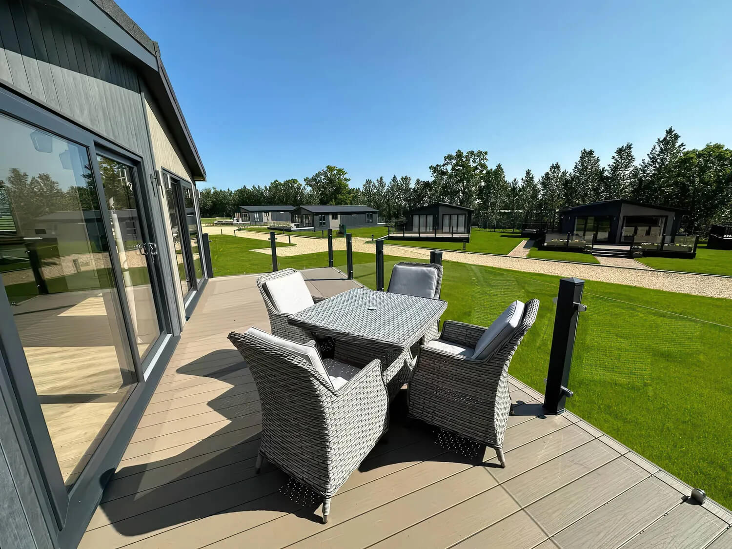 Keld Spring Lodge Retreat - Isca Lodge With Decking Exterior (Front; with Furniture)