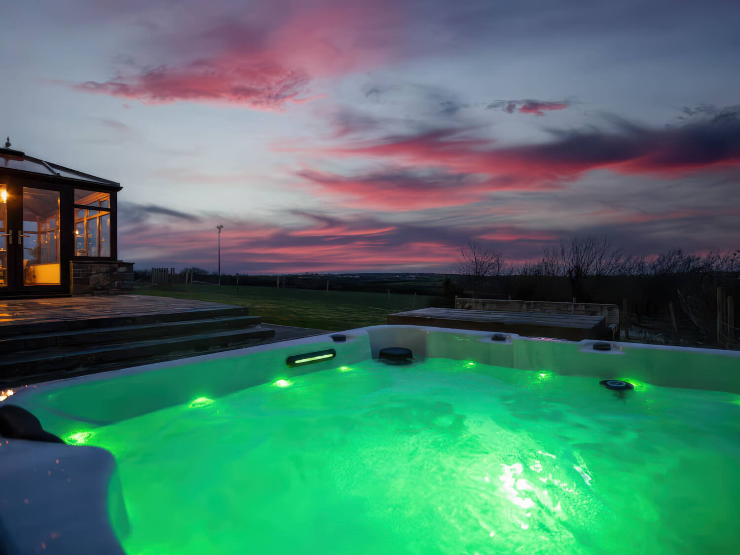 Glan Morfa Lodge Retreat Hot Tub at night