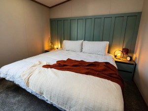 Bedroom in lodge at Fishpool Park